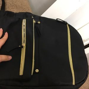 Black & gold backpack, & removable pouch / case